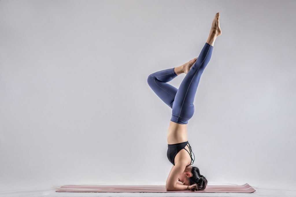 Legs up and hand down in yoga