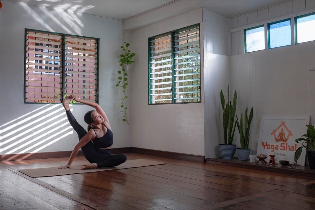 touching toes in yoga